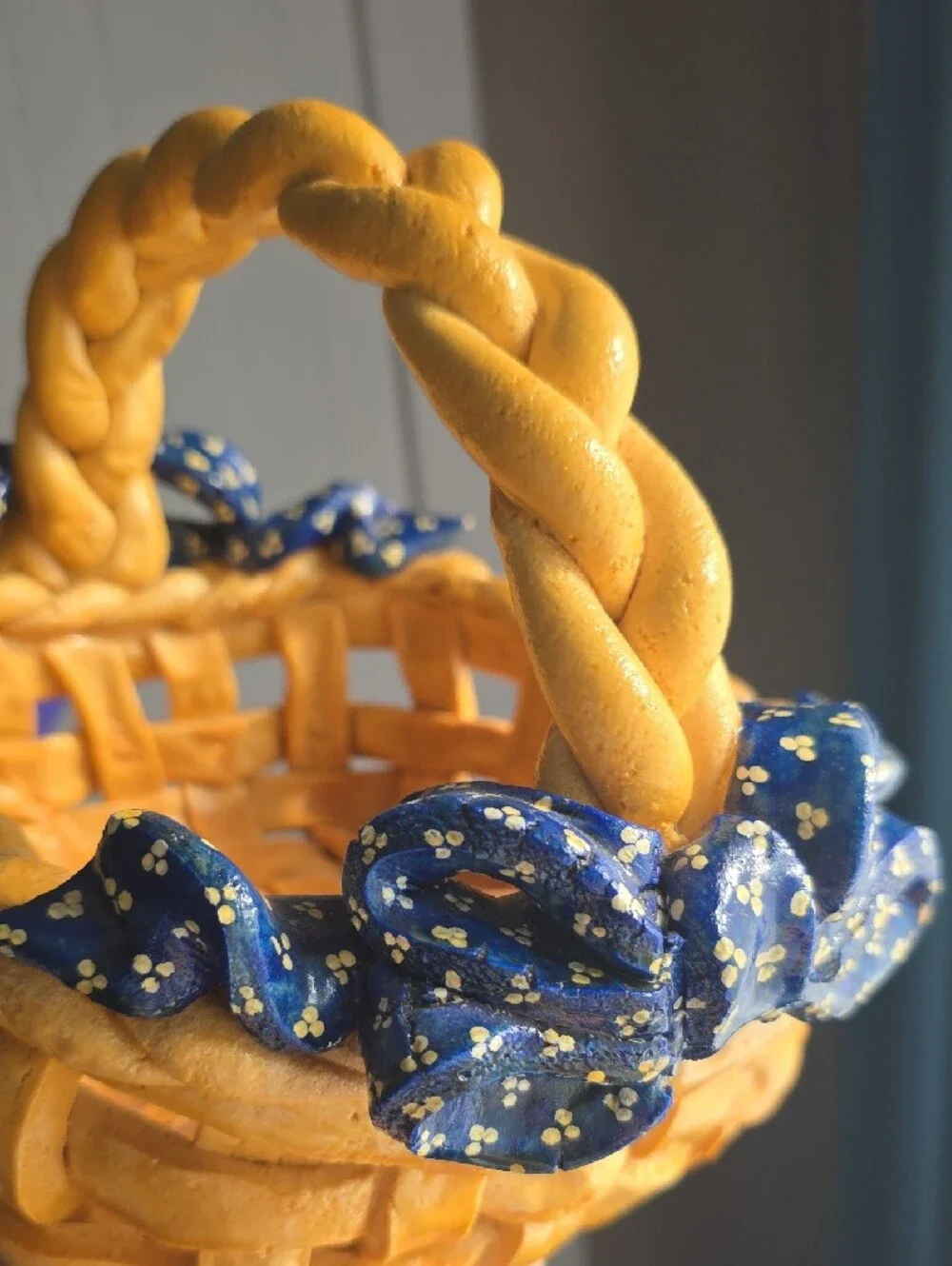 Handcrafted Bread Woven Basket with Navy Ribbon Accents